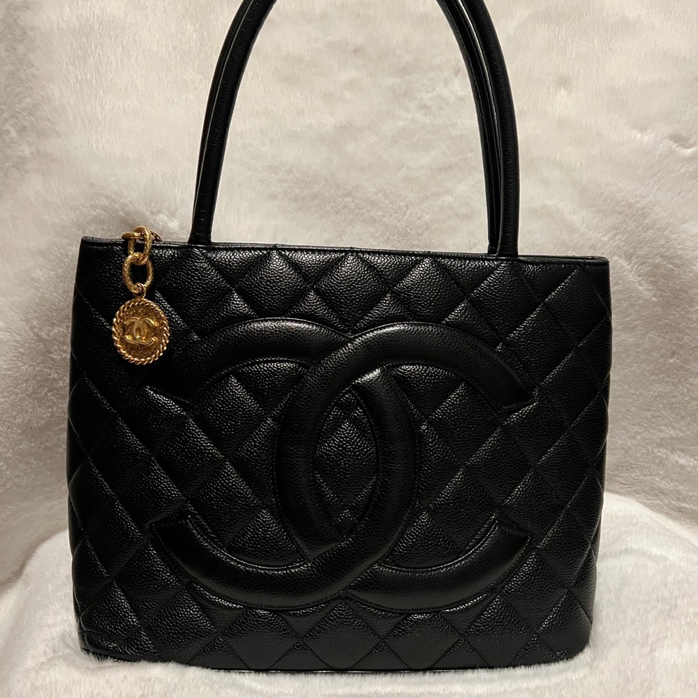 Chanel black caviar medallion tote bag in gold hardware